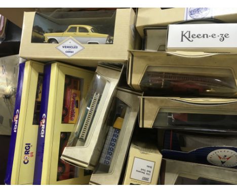 A collection of boxed Lledo and Corgi model vehicles