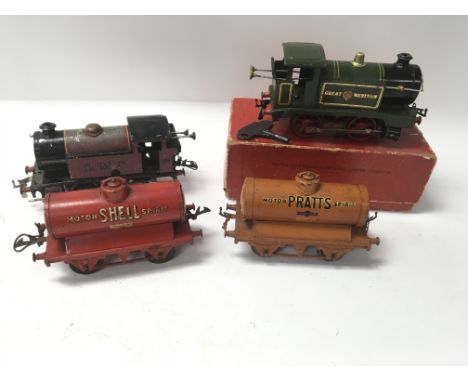 A boxed Hornby “ O “ gauge clockwork No 1 Great Western Tank engine , together with one other locomotive and a collection of 