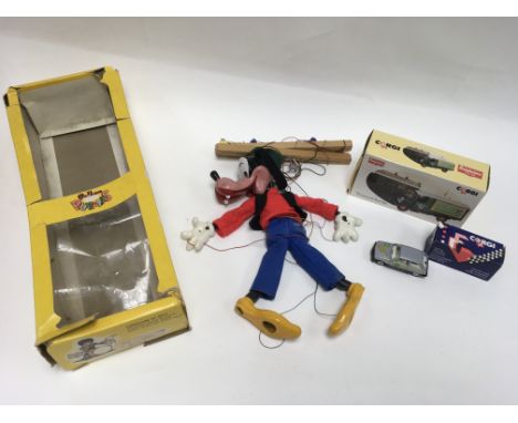 A boxed Disney Goofy Pelham puppet, a Corgi Thornycroft Box Van and a die cast car