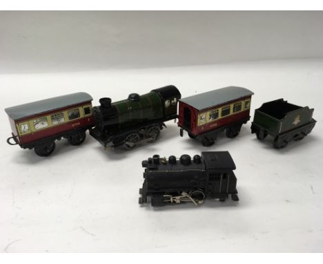 A Hornby type 20 meccano engine with tender and carriage.
