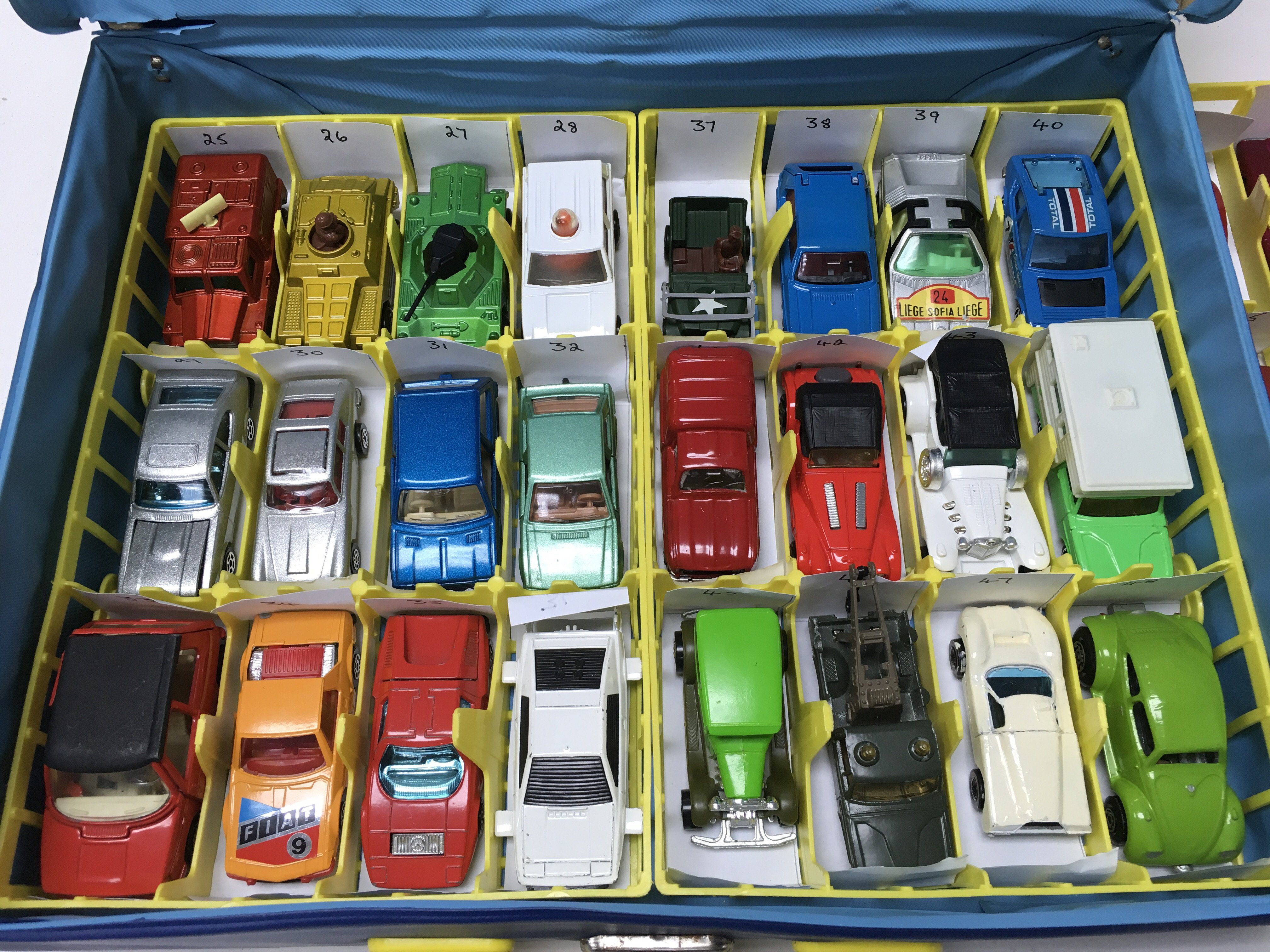 A Matchbox carry case containing 48 unboxed model vehicles including ...