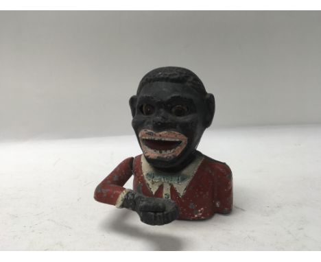 An original vintage novelty money box