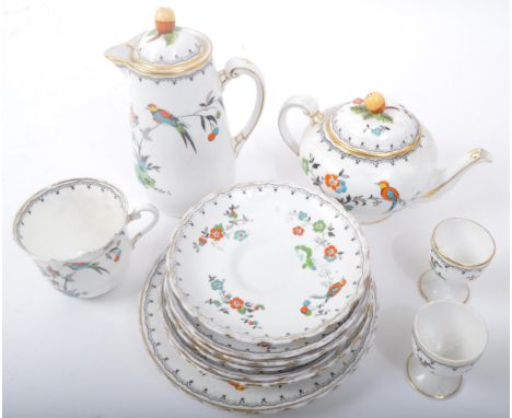 A vintage 20th Century fine bone china tea service set. Plant Tuscan china made in England. Comprising of teapot, coffee pot,