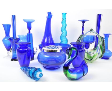 A collection of 20th Century studio art glass. Comprising of; An empoli style twisted textured vase., with a pair of twisted 