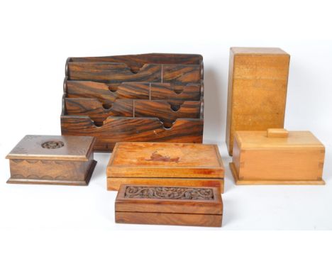 An assortment of vintage 20th century wooden inlaid jewellery / cigarettes boxes. The lot to include a nautical wooden box, a