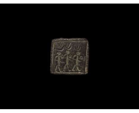 6th-4th century BC. A tabular schist bead with incised border and frieze of three advancing warriors each with sword and roun