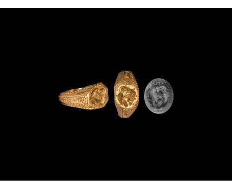 15th century AD. A substantial gold finger ring comprising a D-section hoop with faux-twist pellet detailing, rosettes to the