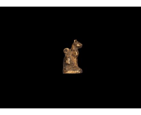 New Kingdom, XVIII Dynasty, 1470-1330 BC. A gold amulet of the goddess Bastet in the form of a seated cat with suspension rin