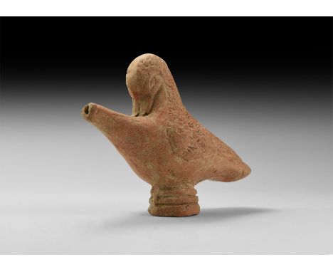 5th-3rd century BC. A hollow-formed terracotta lamp of a standing swan with pellet and chevron detailing to the neck and wing