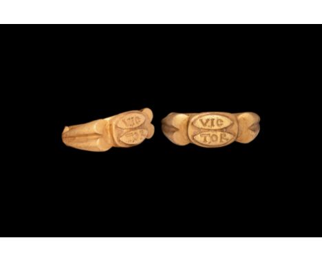 2nd century AD. A gold finger ring comprising a D-section hoop, keeled shoulders with vertical scroll detailing, ellipsoid pl