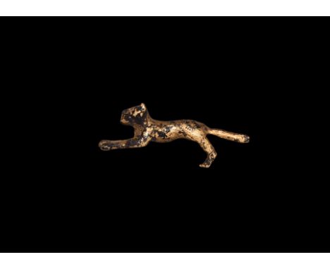 New Kingdom, XVIII Dynasty, 1470-1330 BC. A gold amulet of a leaping cat with front paws extended, back legs stretched; short