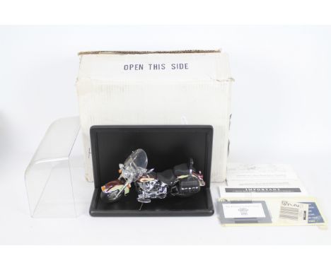 Franklin Mint - A boxed 1:10 scale diecast Harley-Davidson 'The Heritage Softail Classic' by Franklin Mint. The model appears