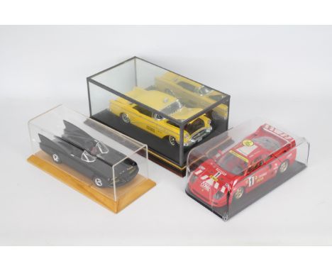 Johnny Lightning, Mira, Bburago - Three unboxed 1:18 scale diecast models. Lot consists of Johnny Lightning 'Batmobile'; Bbur