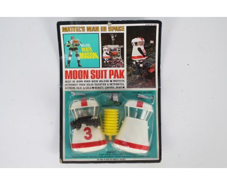 Mattel - Man In Space - An unopened 1966 dated Major Matt Mason Moon Suit Pak # 6301. The items appear in Mint condition in a