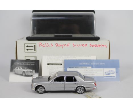 Franklin Mint - A boxed 1:24 scale Rolls Royce Silver Seraph by Franklin Mint. The model appears to be in Mint condition with