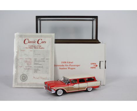 Danbury Mint - A boxed 1:24 scale 1958 Edsel Bermuda six-Passenger Station Wagon by Danbury Mint. The model appears to be in 