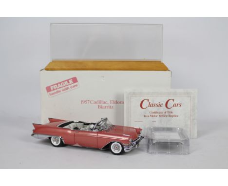 Danbury Mint - A boxed 1:24 scale 1957 Cadillac Eldorado Biarritz by Danbury Mint. The model appears to be in Mint condition 