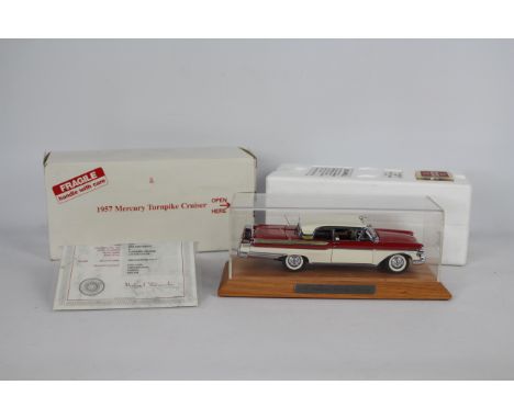 Danbury Mint - A boxed 1:24 scale 1957 Mercury Turnpike Cruiser by Danbury Mint. The model appears to be in Mint condition an