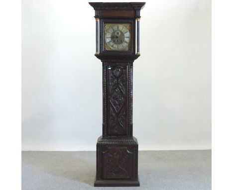 An 18th century carved oak cased longcase clock, the brass dial signed Sam Reeve, Stoneham, with a thirty hour movement, 208c