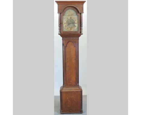 An 18th century oak cased longcase clock, with a brass dial and eight day movement, striking on a bell, 219cm tall