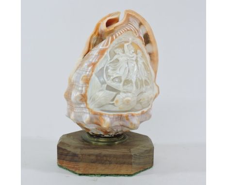A shell lamp, carved with a cameo of the three graces, 17cm tall