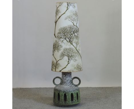 A 1960's German pottery table lamp, with shade, 123cm tall overall