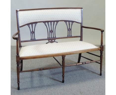 An Edwardian cream upholstered chair back sofa, 113cm