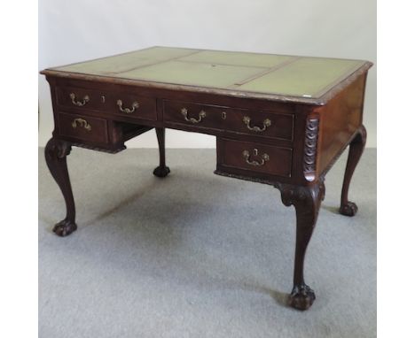 An early 20th century Chippendale style kneehole desk, on cabriole legs, 122cm