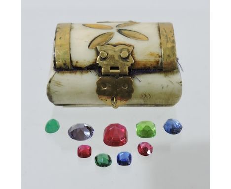 A trinket box, with a small collection of gemstones