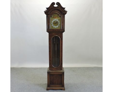 A modern Hertz walnut cased longcase clock, with Westminster chimes, 199cm tall