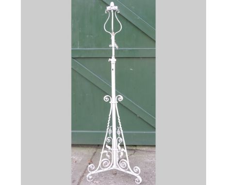 A white painted wrought iron standard lamp, 168cm tall