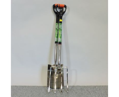 A stainless steel border fork and spade