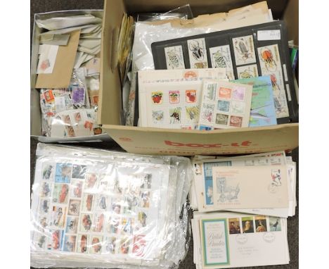 A large collection of loose stamps and first day covers