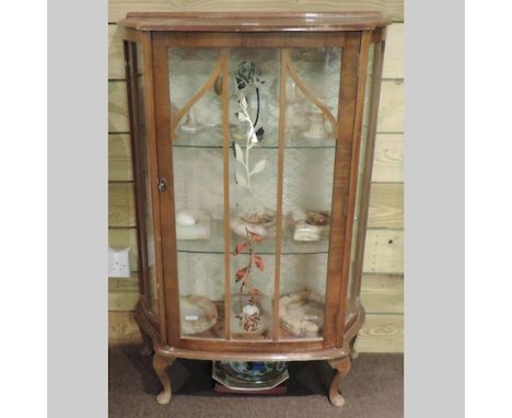 An Art Nouveau style wall mirror, together with a 1930's display cabinet, 73cm