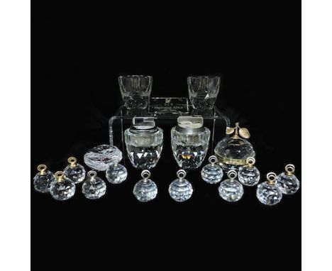 A collection of Swarovski crystal items to include table cigarette lighters, card holders, cigarette holders, etc, largest 8.