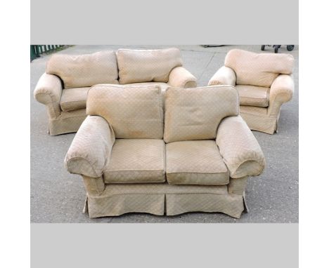 A Multiyork gold upholstered three seater sofa, 203cm, together with a matching two seater sofa and an armchair