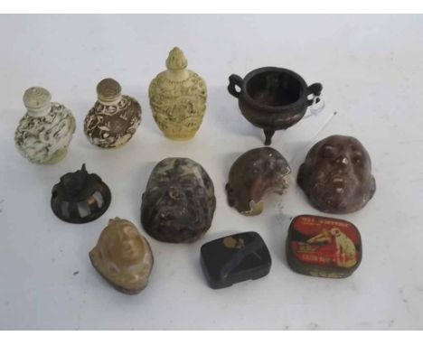Set of three paper m ch painted small masks (one a/f), together with a carved nut of a gent, together with three resin Orient