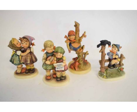 Mixed Lot: four Hummel Goebel figures to include a young girl seated in a tree with a dog at foot, a boy perched on a fence, 