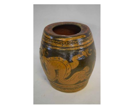 Antique terracotta barrel formed garden seat with brown glazed and dragon design, with a Grecian key style border, 40cms diam
