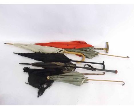 Group containing seven assorted vintage parasols with turned handles, varying mounts 