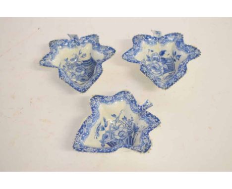 Three 19th century blue and white Spode leaf formed pickle dishes with blue printed centres, with a basket of flowers, each 1