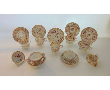 An interesting collection of early 19th century tea wares with various painted and gilded floral sprigs and sprays including 