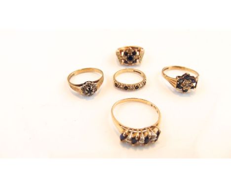 A sapphire and diamond ring, set with four marquise-cut untested sapphires, interspersed with six single-cut diamonds, in 14c