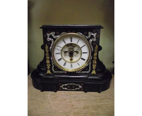 A 19th century French mantel clock, the timber case inlaid with mother-of-pearl and applied brass detail, with 8-day timepiec