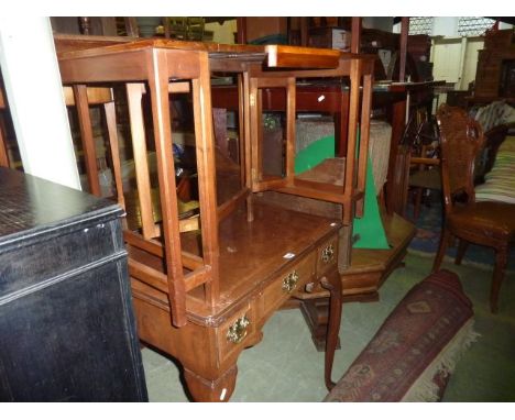 A Cotswold school metamorphic occasional table raised on a series of chamfered supports and with hinged framework, 90 cm wide