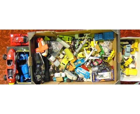 A box containing a quantity of die cast model vehicles to include a Dinky Coventry Climax forklift truck, a boxed Burago Buga