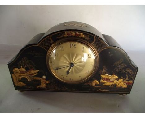 An Edwardian mantel clock with black lacquered and chinoiserie detail and 8-day timepiece