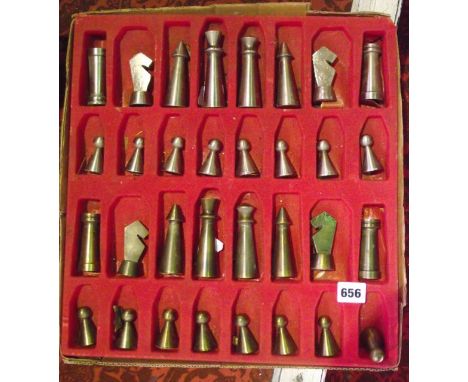 A vintage metalwork chess set 
