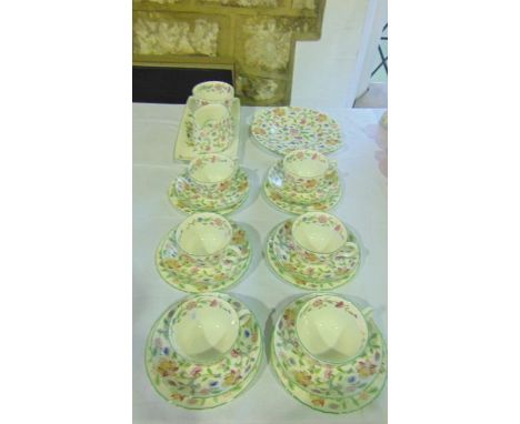 A collection of Minton Haddon Hall pattern tea wares comprising a cake plate, milk jug, sugar bowl, rectangular sandwich tray
