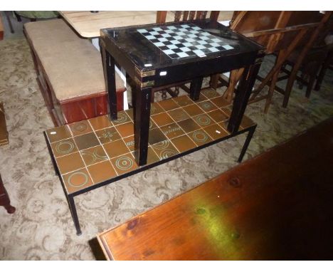 A 1960s occasional table, the steel frame enclosing an abstract ceramic tiled top together with a further games table and an 